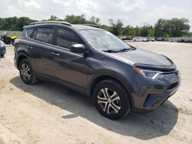 Photo 4 from auction – 2018 TOYOTA RAV4 LE with VIN JTMZFREV2JJ174100