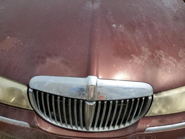 Photo 11 from auction – 2000 LINCOLN TOWN CAR E with VIN 1LNHM81W3YY770033