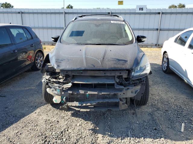 Photo 5 from auction – 2014 FORD ESCAPE TIT with VIN 1FMCU0J92EUB92595