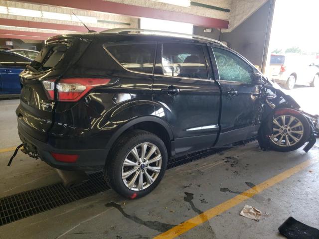 Photo 3 from auction – 2017 FORD ESCAPE TIT with VIN 1FMCU9JD0HUC77402