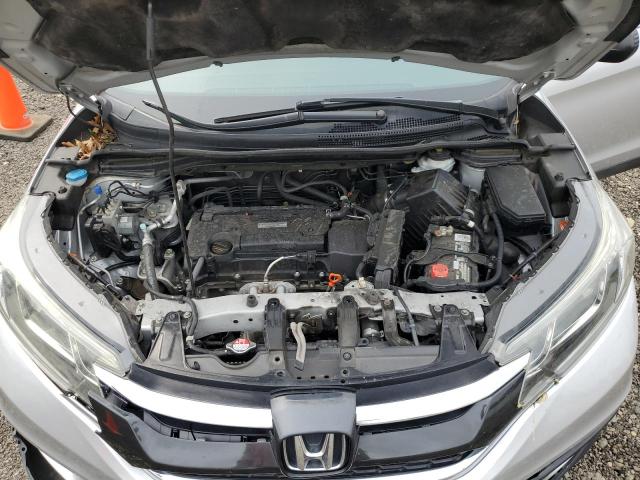 Photo 12 from auction – 2016 HONDA CR-V SE with VIN 2HKRM3H40GH553023