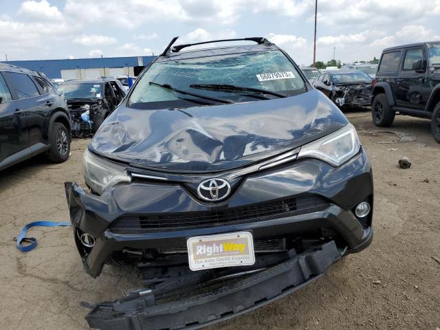Photo 5 from auction – 2016 TOYOTA RAV4 XLE with VIN 2T3RFREV2GW523637
