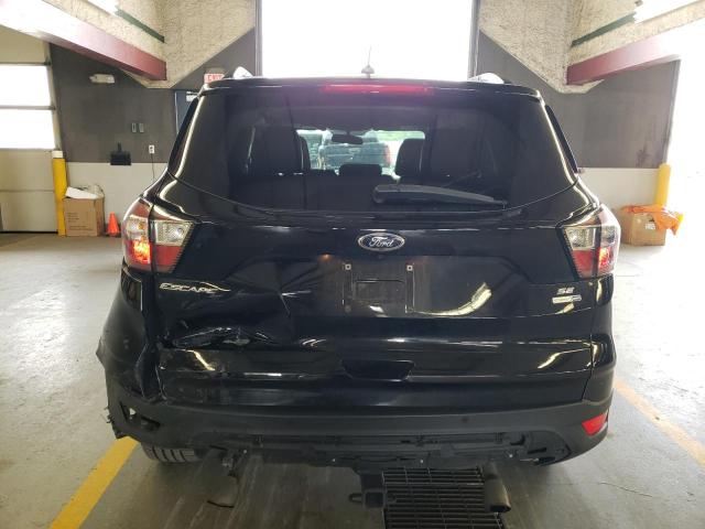Photo 6 from auction – 2017 FORD ESCAPE SE with VIN 1FMCU9GD7HUC32089