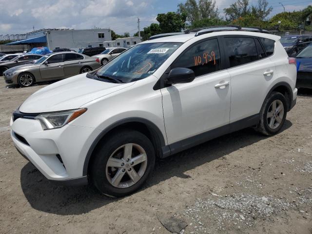 TOYOTA RAV4 LE 2017 with VIN JTMZFREV7HJ701459 - Photo from auction