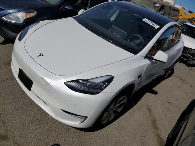 TESLA MODEL Y 2022 with VIN 7SAYGDEE7NF403463 - Photo from auction