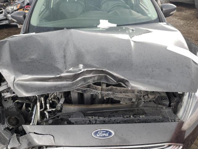 Photo 11 from auction – 2018 FORD FOCUS TITA with VIN 1FADP3J28JL326598