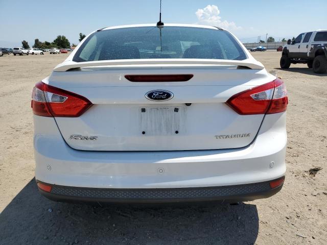 Photo 6 from auction – 2014 FORD FOCUS TITA with VIN 1FADP3J23EL303512