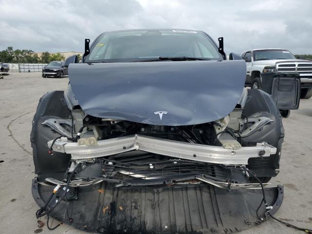 Photo 5 from auction – 2021 TESLA MODEL Y with VIN 5YJYGDED3MF103695