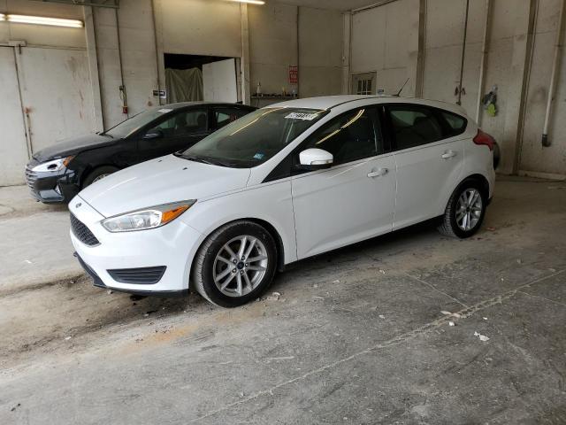 FORD FOCUS SE 2017 with VIN 1FADP3K22HL296667 - Photo from auction