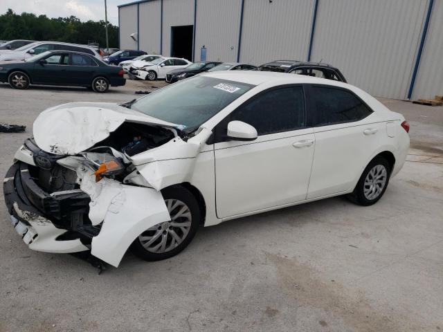 TOYOTA COROLLA L 2017 with VIN 5YFBURHE3HP654509 - Photo from auction