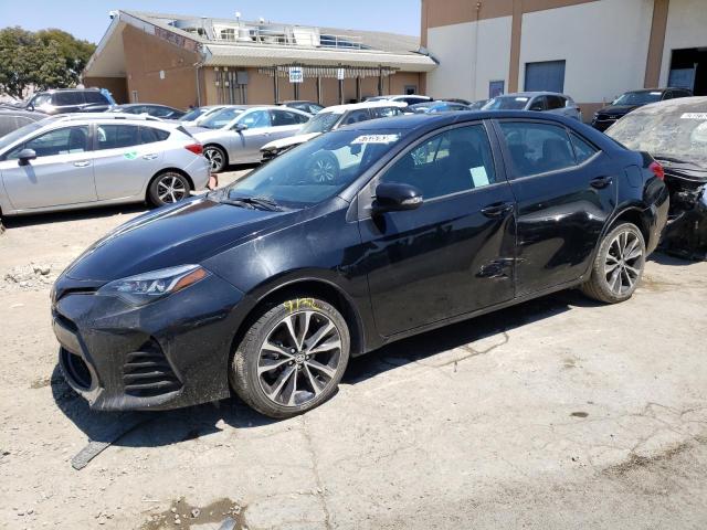 TOYOTA COROLLA L 2018 with VIN 2T1BURHEXJC087110 - Photo from auction