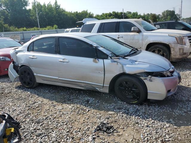 Photo 4 from auction – 2011 HONDA CIVIC LX with VIN 19XFA1F59BE030074