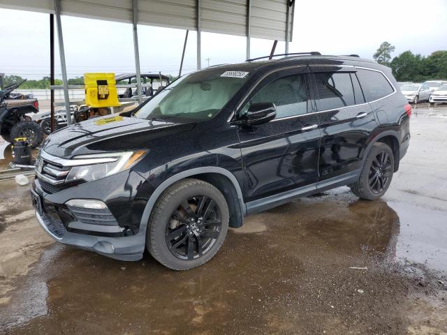 HONDA PILOT TOUR 2016 with VIN 5FNYF6H97GB004419 - Photo from auction