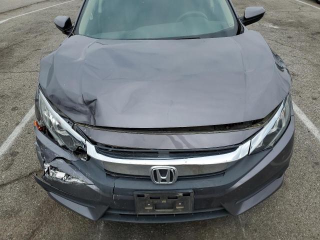 Photo 11 from auction – 2018 HONDA CIVIC LX with VIN 2HGFC2F59JH521183