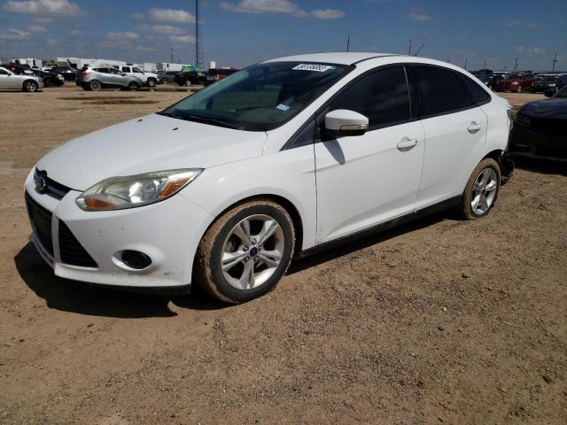FORD FOCUS SE 2014 with VIN 1FADP3F21EL318504 - Photo from auction