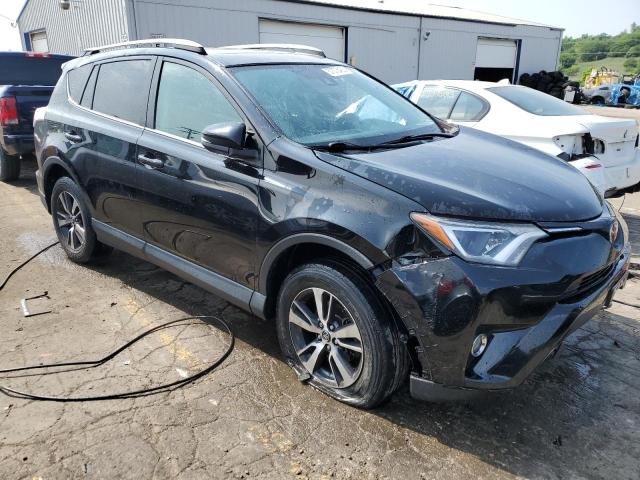 Photo 4 from auction – 2017 TOYOTA RAV4 XLE with VIN 2T3RFREV5HW620851