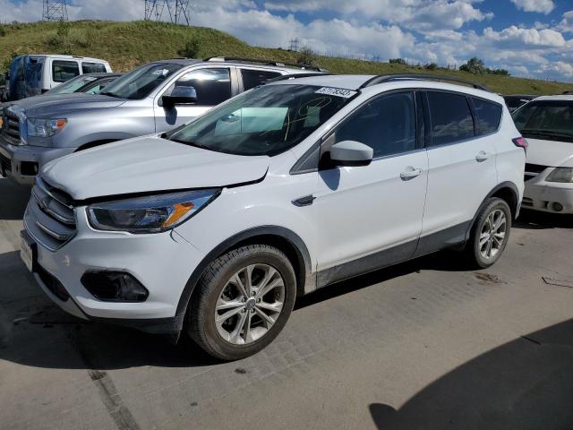 FORD ESCAPE SE 2018 with VIN 1FMCU9GD3JUC11780 - Photo from auction