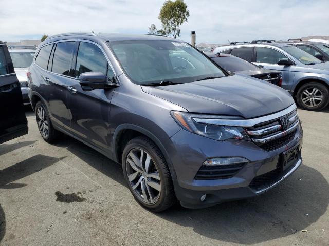 Photo 4 from auction – 2016 HONDA PILOT TOUR with VIN 5FNYF6H97GB082022