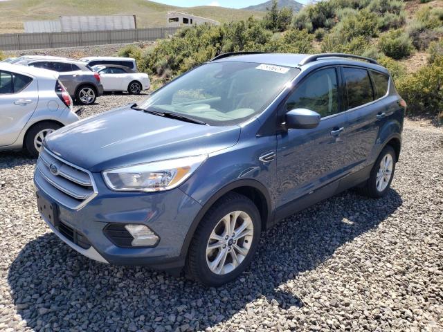FORD ESCAPE SE 2018 with VIN 1FMCU9GD9JUC62474 - Photo from auction