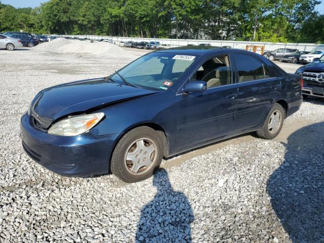 TOYOTA CAMRY LE 2003 with VIN 4T1BF30K23U057285 - Photo from auction