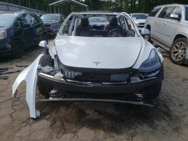 Photo 5 from auction – 2021 TESLA MODEL 3 with VIN 5YJ3E1EC1MF083355