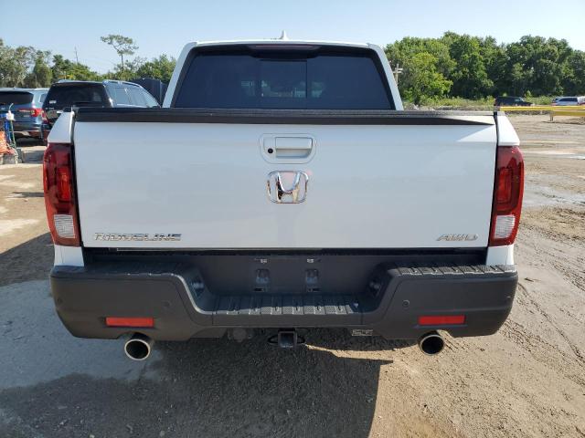 Photo 6 from auction – 2022 HONDA RIDGELINE with VIN 5FPYK3F78NB018846