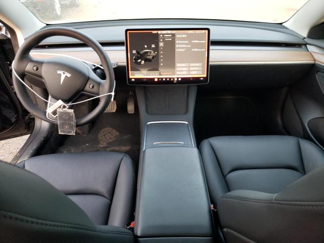 Photo 8 from auction – 2022 TESLA MODEL 3 with VIN 5YJ3E1EB8NF305141