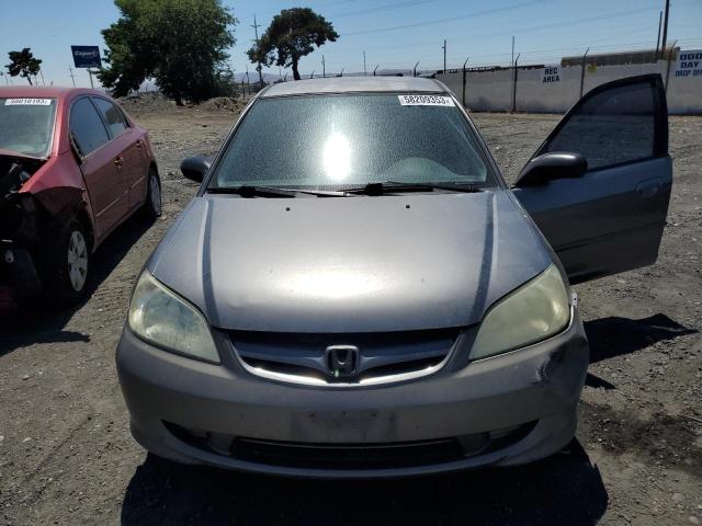 Photo 11 from auction – 2004 HONDA CIVIC LX with VIN 2HGES16514H548262