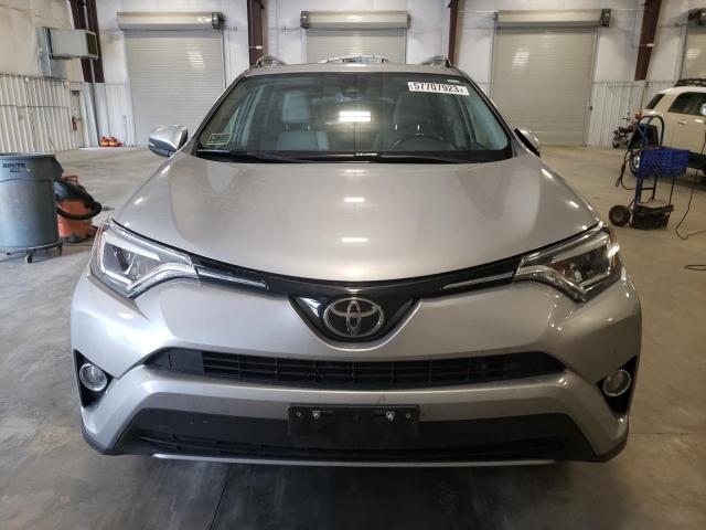 Photo 5 from auction – 2018 TOYOTA RAV4 LIMIT with VIN JTMDFREV4JD241580