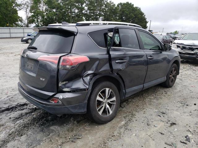 Photo 3 from auction – 2016 TOYOTA RAV4 XLE with VIN JTMWFREV8GJ099057