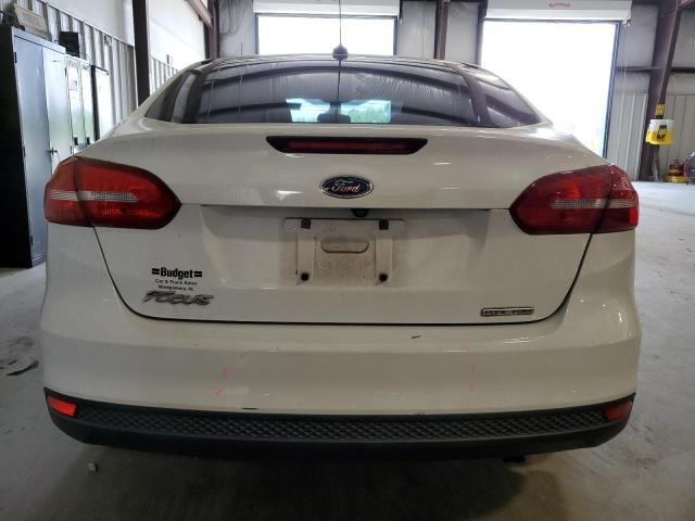 Photo 6 from auction – 2015 FORD FOCUS S with VIN 1FADP3E24FL274808