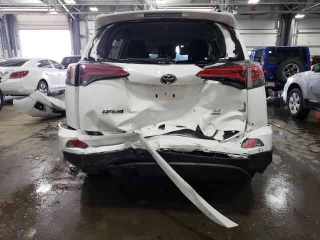 Photo 6 from auction – 2017 TOYOTA RAV4 LE with VIN JTMBFREV1HD214564