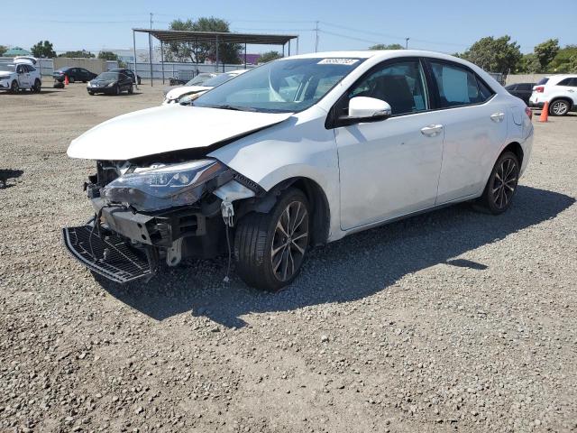 TOYOTA COROLLA L 2018 with VIN 5YFBURHEXJP769498 - Photo from auction