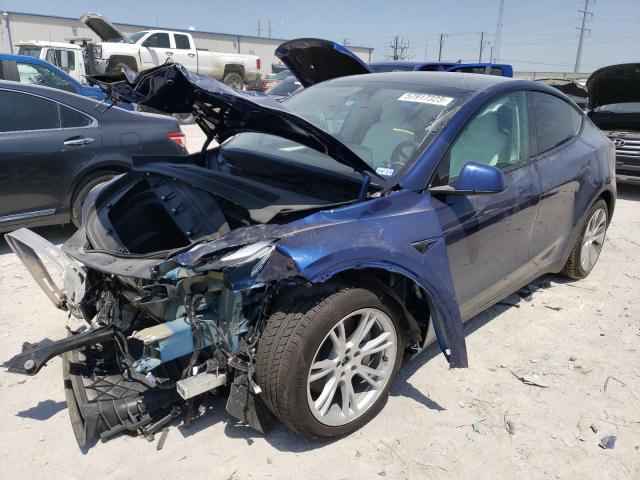 TESLA MODEL Y 2023 with VIN 7SAYGAEE0PF765779 - Photo from auction