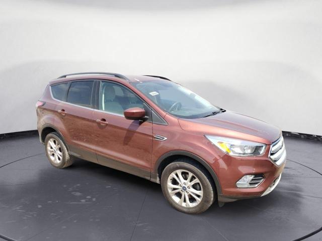 Photo 4 from auction – 2018 FORD ESCAPE SE with VIN 1FMCU0GD1JUC69480