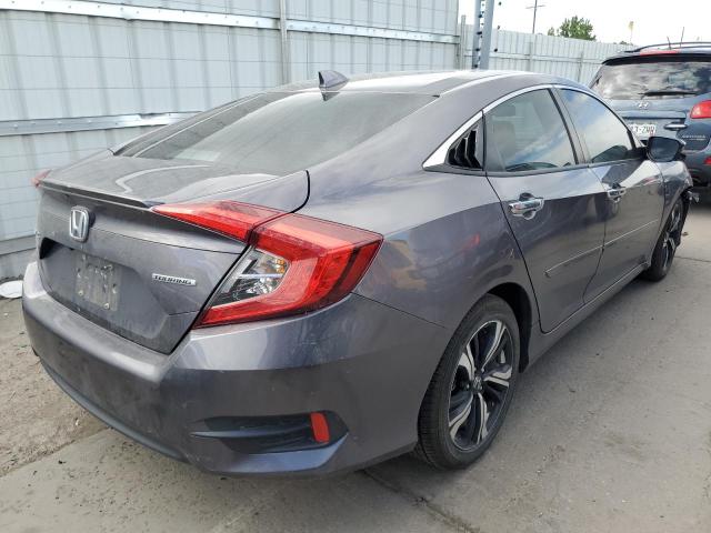 Photo 3 from auction – 2016 HONDA CIVIC TOUR with VIN 19XFC1F91GE028792