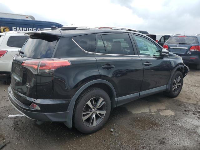 Photo 3 from auction – 2016 TOYOTA RAV4 XLE with VIN 2T3RFREV6GW515721
