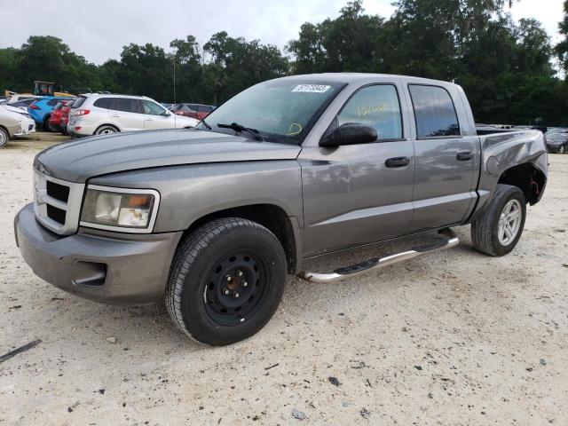 DODGE DAKOTA SLT 2011 with VIN 1D7RE3GK0BS701328 - Photo from auction
