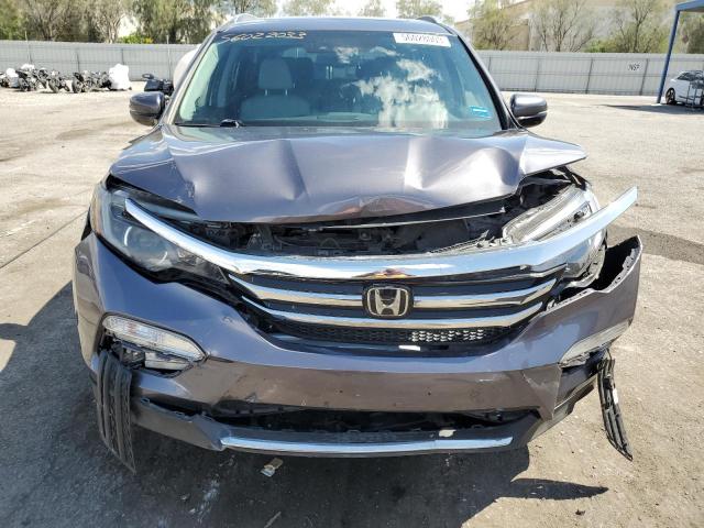 Photo 5 from auction – 2016 HONDA PILOT ELIT with VIN 5FNYF6H06GB067819