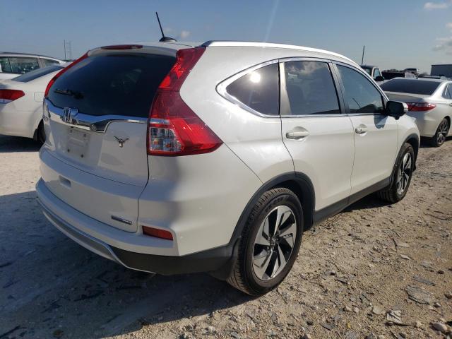 Photo 3 from auction – 2016 HONDA CR-V TOURI with VIN 5J6RM3H97GL021737