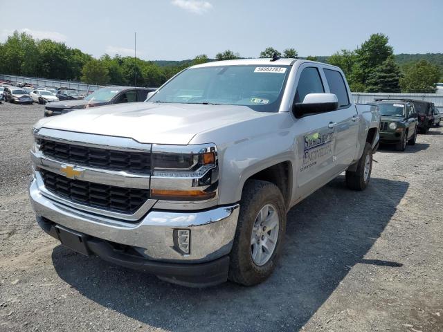 CHEVROLET SILVERADO 2018 with VIN 3GCUKREC0JG616023 - Photo from auction