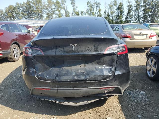 Photo 6 from auction – 2022 TESLA MODEL Y with VIN 7SAYGDEE7NF324911
