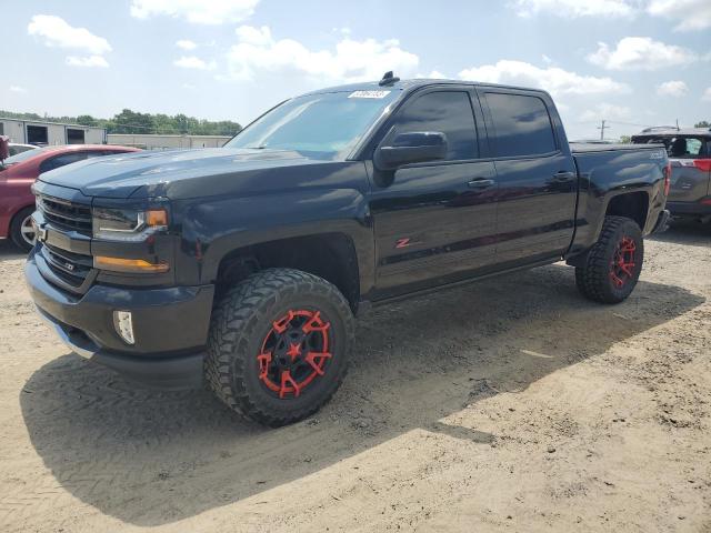 CHEVROLET SILVERADO 2018 with VIN 3GCUKREC6JG136813 - Photo from auction