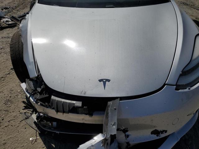 Photo 11 from auction – 2018 TESLA MODEL 3 with VIN 5YJ3E1EA8JF004595