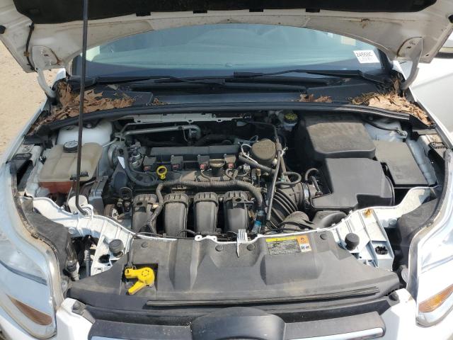 Photo 11 from auction – 2013 FORD FOCUS SE with VIN 1FADP3F22DL104300