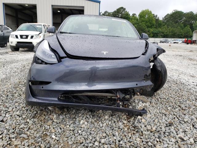 Photo 11 from auction – 2022 TESLA MODEL 3 with VIN 5YJ3E1EB7NF196560