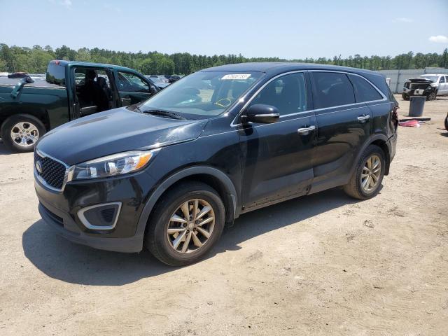 KIA SORENTO LX 2016 with VIN 5XYPG4A32GG125015 - Photo from auction