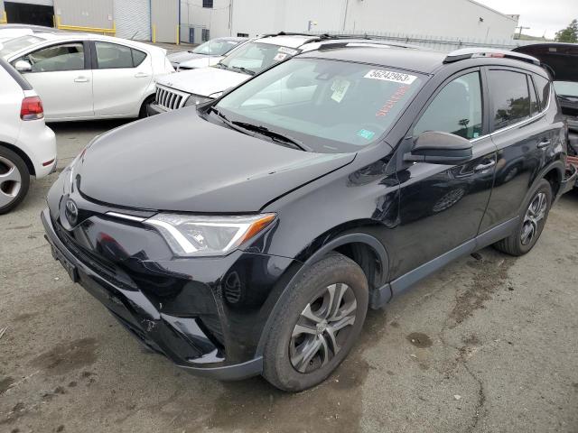 TOYOTA RAV4 LE 2018 with VIN 2T3ZFREV3JW490705 - Photo from auction