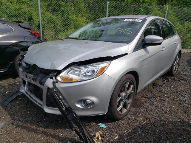 FORD FOCUS SE 2013 with VIN 1FADP3K21DL129078 - Photo from auction