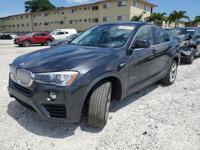 BMW X4 XDRIVE2 2015 with VIN 5UXXW3C51F0M87481 - Photo from auction